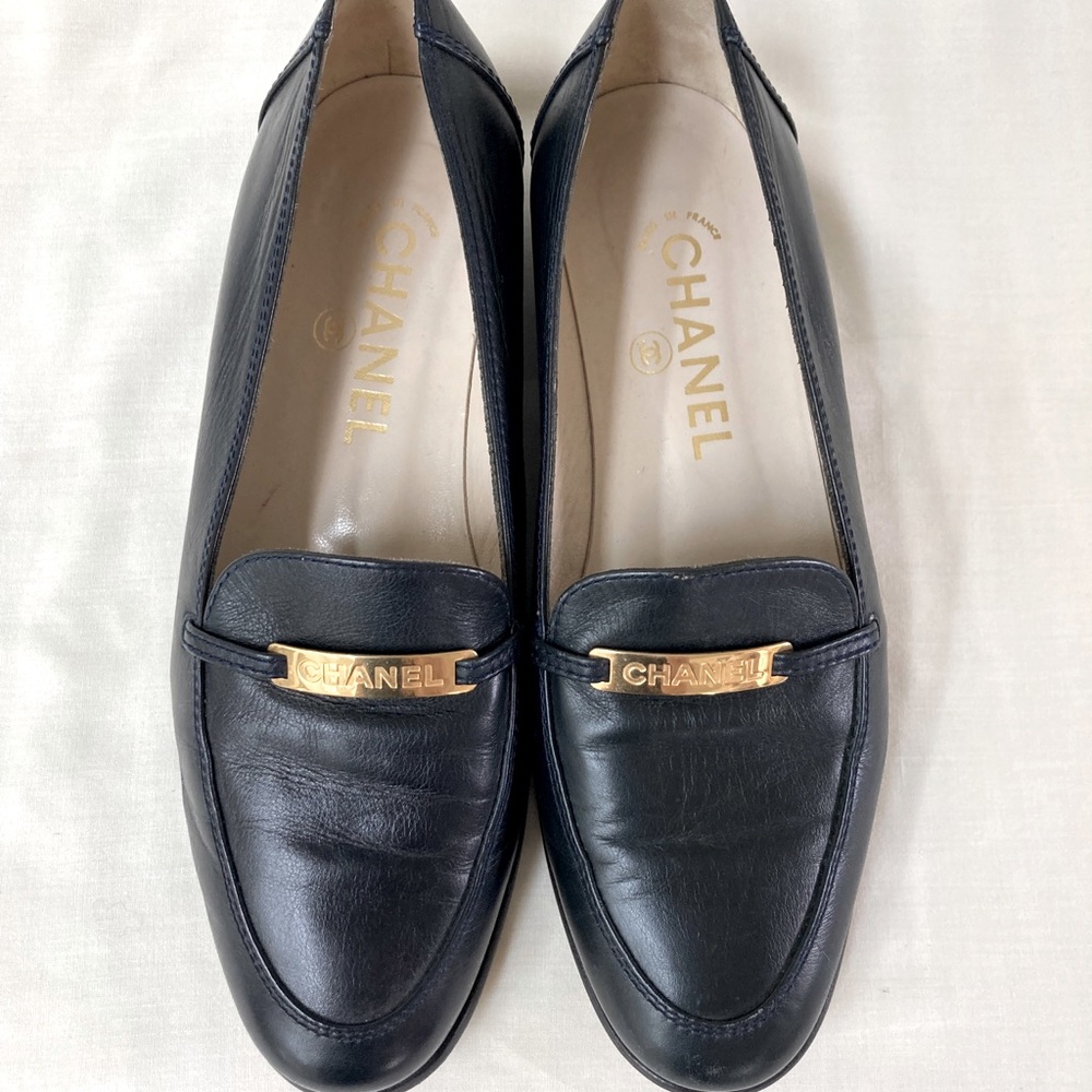 CHANEL Black Leather Loafers with Gold Accent